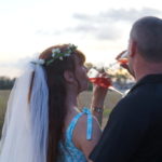 The wandering wedding dress diary with tegan marshall becoming engaged photo with tegan mathews making a toast with Clark