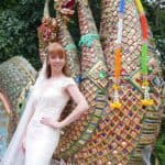 Tegan Marshall In The Wandering Wedding Dress Close Up With Buddhist Temple Dragon Stairs