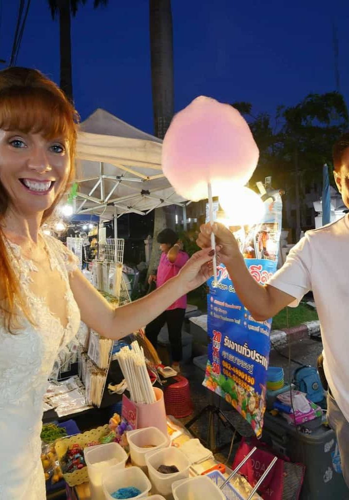 Tegan Marshall Getting Fairy Floss At Chiang Mai Night Markets While In Her Wandering Wedding Dress
