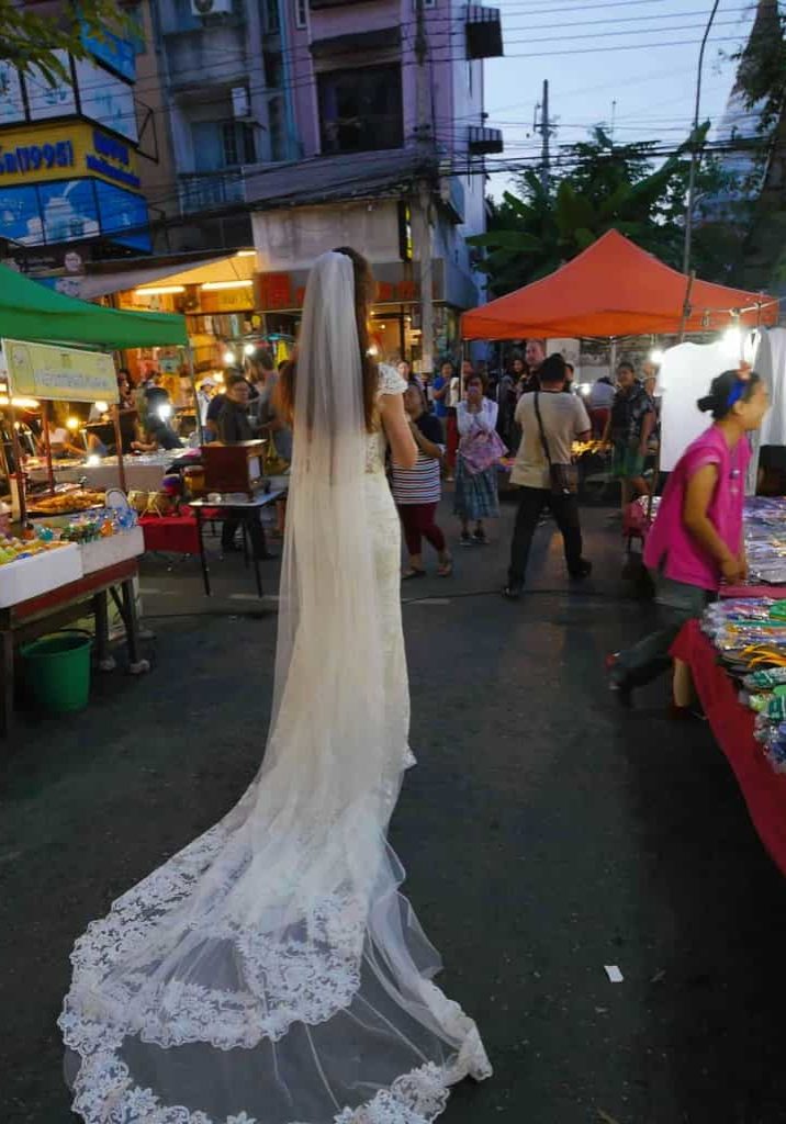 Tegan Marshall Wandering Through The Night Markets In Chiang Mai In The Wandering Wedding Dress